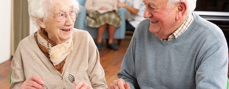 Residents having social interactions while dining Residents having social interactions while dining