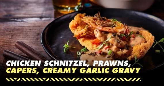 Chicken schnitzel, prawns, capers, creamy garlic gravy