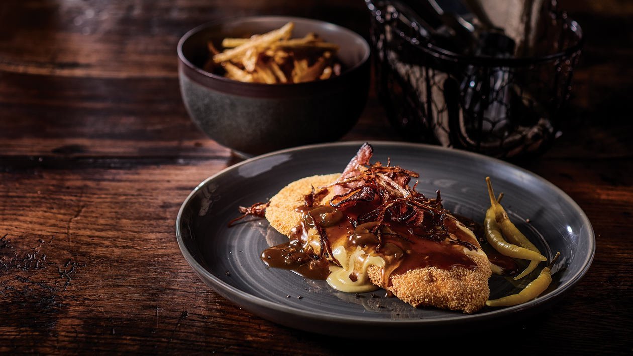 Chicken Schnitzel, Jalapeno Gravy, Cheese Fondue, Bacon, Tobacco Onions – Recipe Chicken Schnitzel, Jalapeno Gravy, Cheese Fondue, Bacon, Tobacco Onions – Recipe