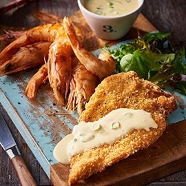 Chicken Schnitzel, Jumbo Prawns, Garlic Sauce Chicken Schnitzel, Jumbo Prawns, Garlic Sauce
